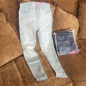 Pack of four shades of Blue Girls Stretch Skinny Jeans. Size 16